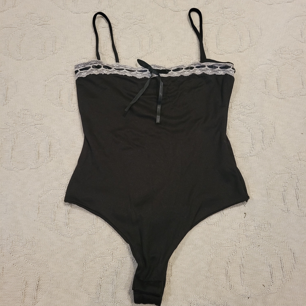 ★ . black body suit with lace trim